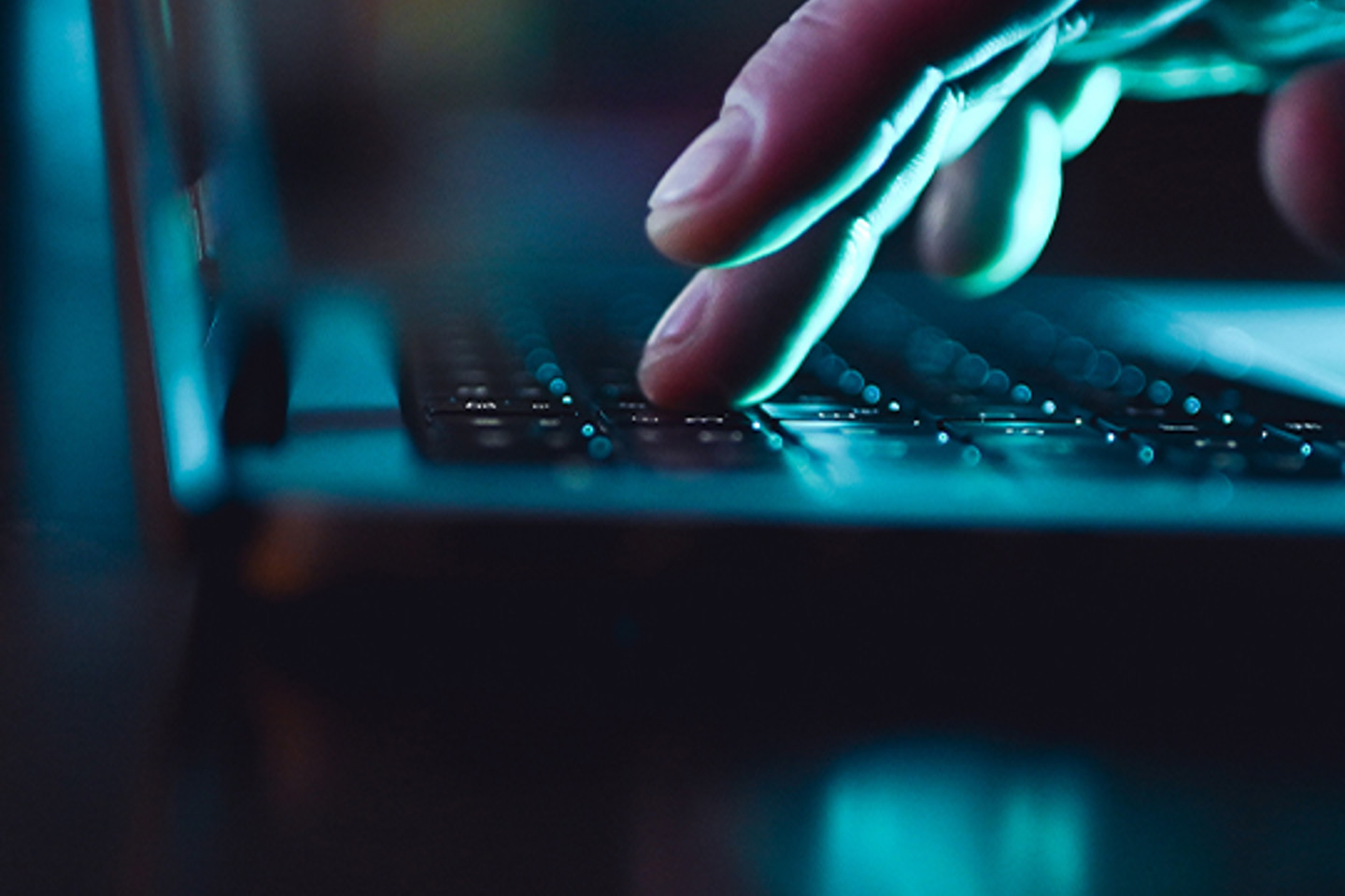 M Files Portrait 3 hands typing on keyboard in dark