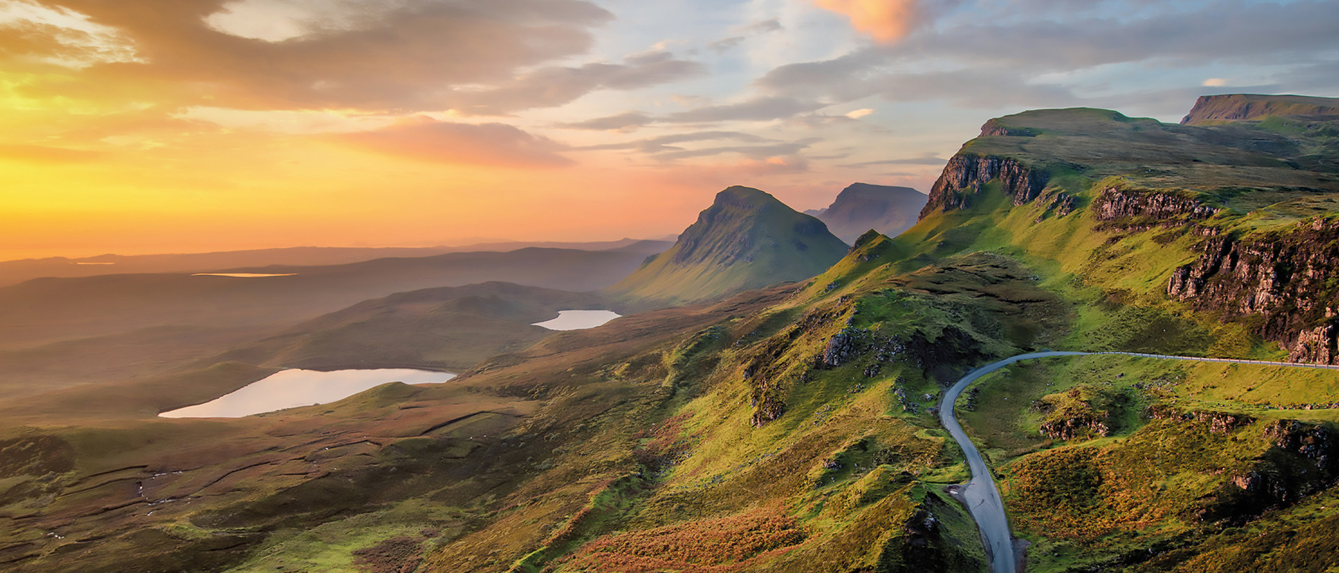 Bregal RIR 2021 22 Cover 1920X823 sunset clifftop landscape