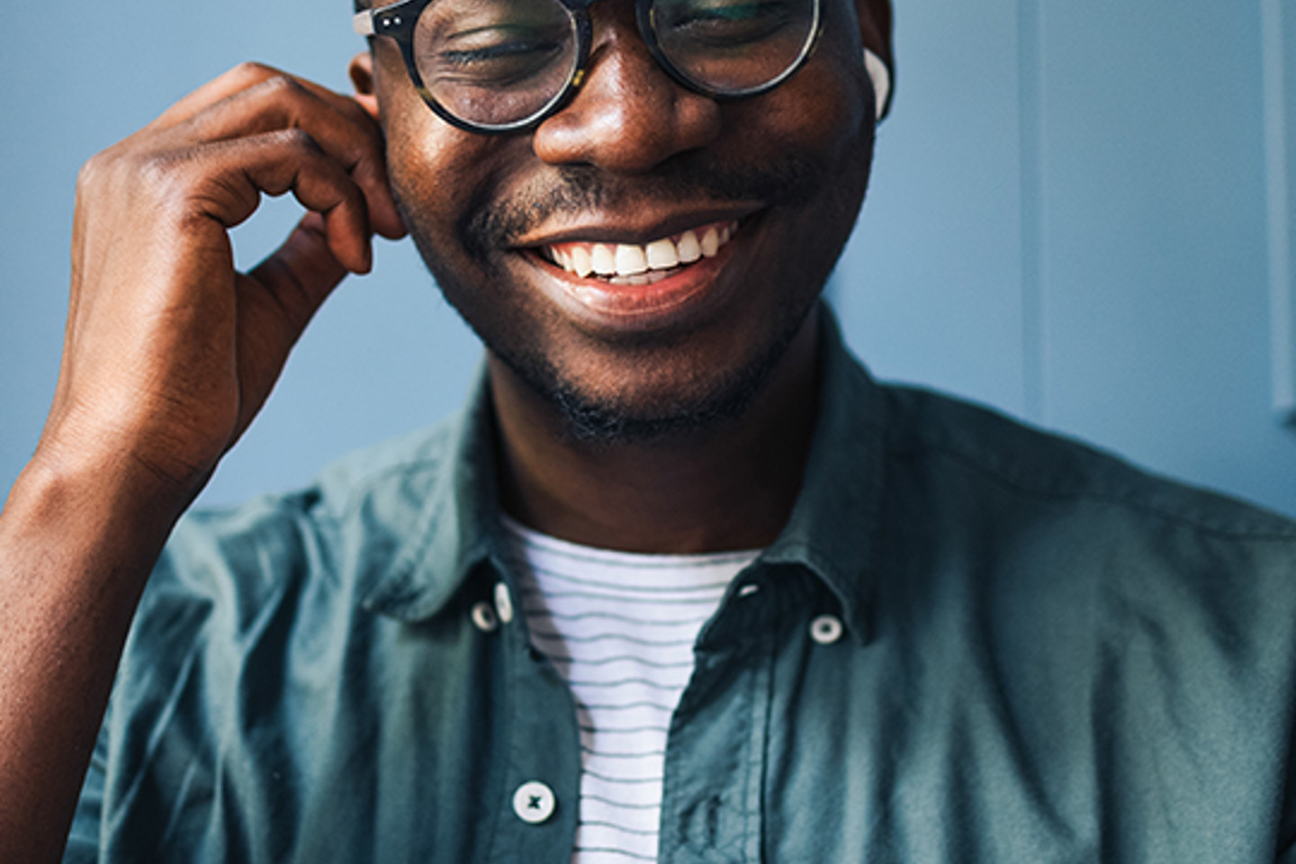Anywhere 365 Portrait 2 man with earphones smiling