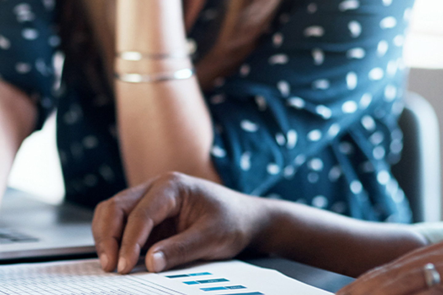 Basware Portrait 1 people looking over paperwork